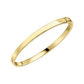 A single, wide, plain hinged bangle in sterling silver with gold plating, shown slightly open on a white background.