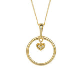 Gold necklace with a heart-shaped pendant on a white background