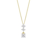 A 9ct yellow gold pendant featuring three vertically stacked diamonds in white gold illusion settings, shown on a fine gold chain.