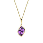 Gold necklace with a purple teardrop pendant on a white background