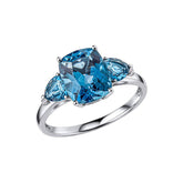 Trilogy Blue Topaz Ring in Gold
