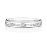 A front view of a platinum half eternity ring featuring princess cut diamonds in a channel setting.