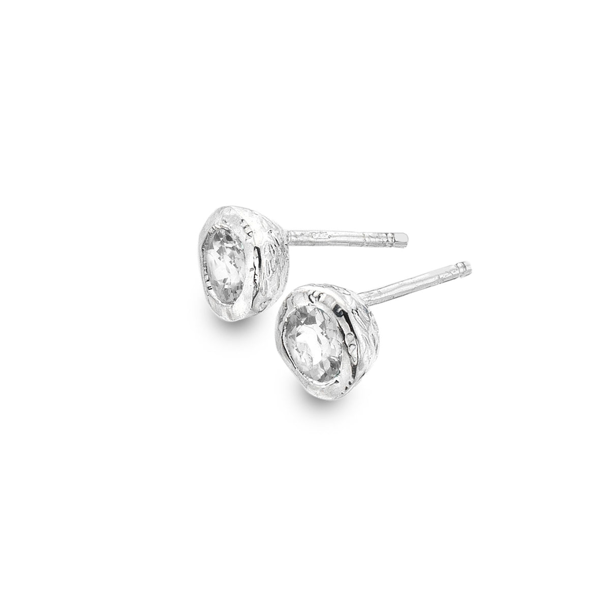 A pair of chunky, textured sterling silver stud earrings set with faceted white topaz stones, shown on a white background.