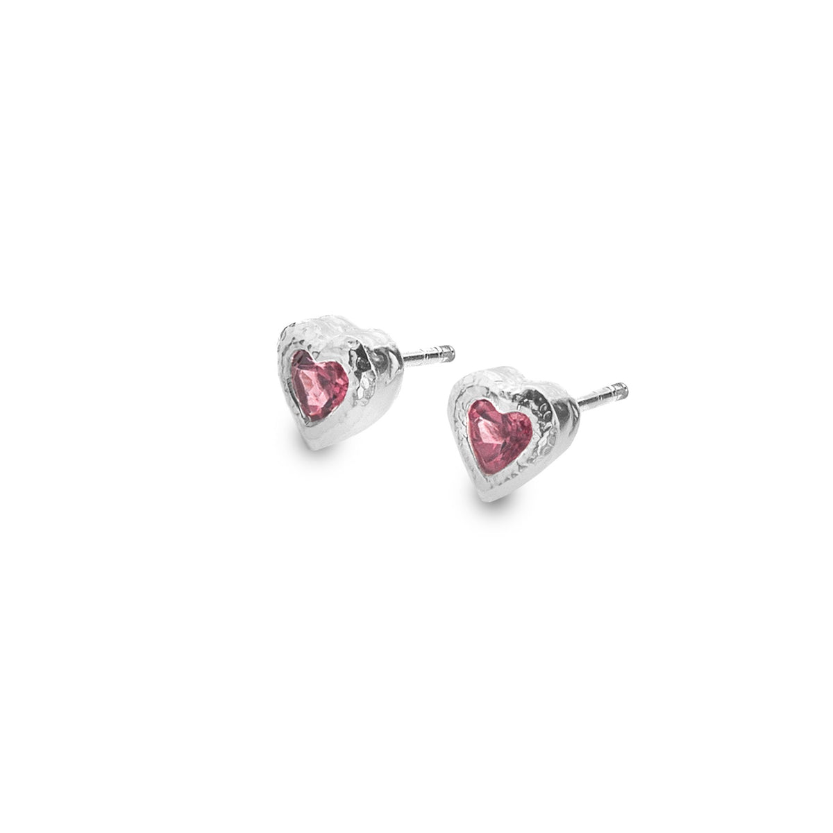 A pair of Silver Origins textured sterling silver heart stud earrings set with faceted pink tourmaline stones, on a white background.