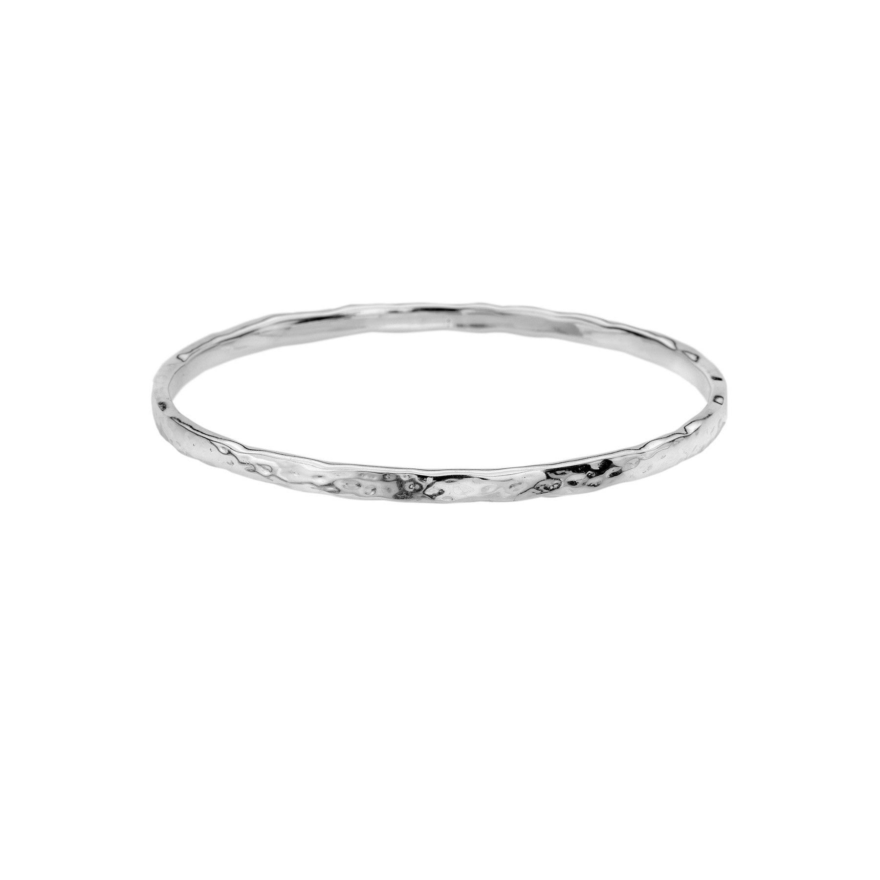 A slender sterling silver bangle with a reflective hammered texture, shown on a white background.