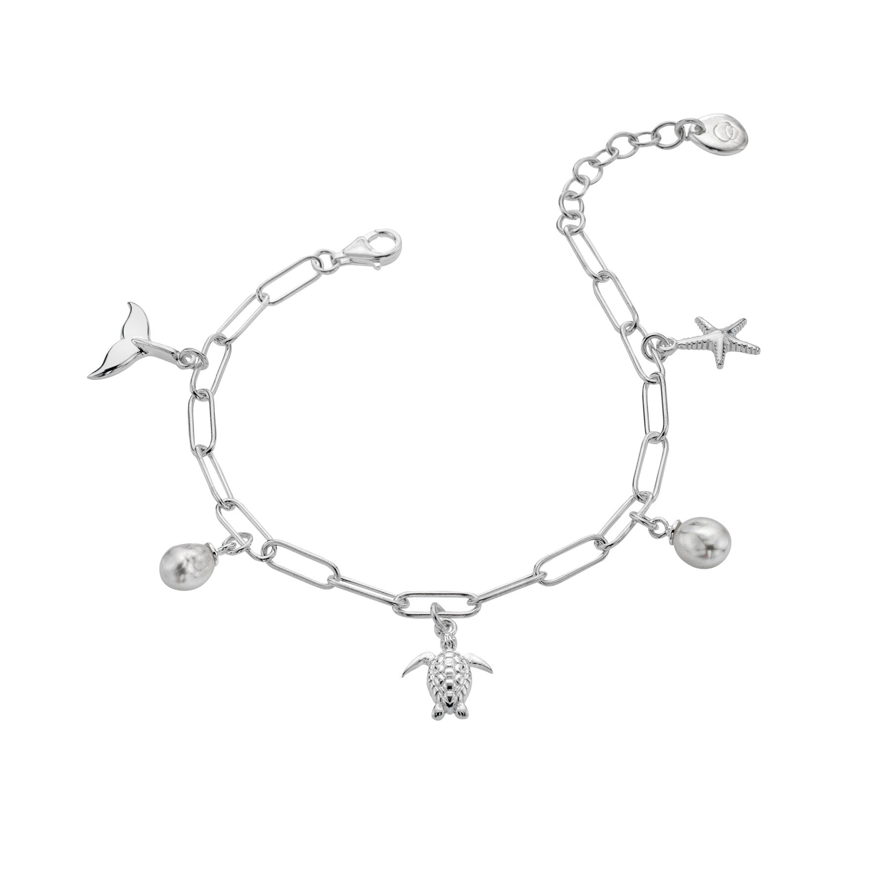 A sterling silver charm bracelet on a paperclip chain, featuring turtle, starfish, and whale tail charms interspersed with freshwater pearls, on a white background.