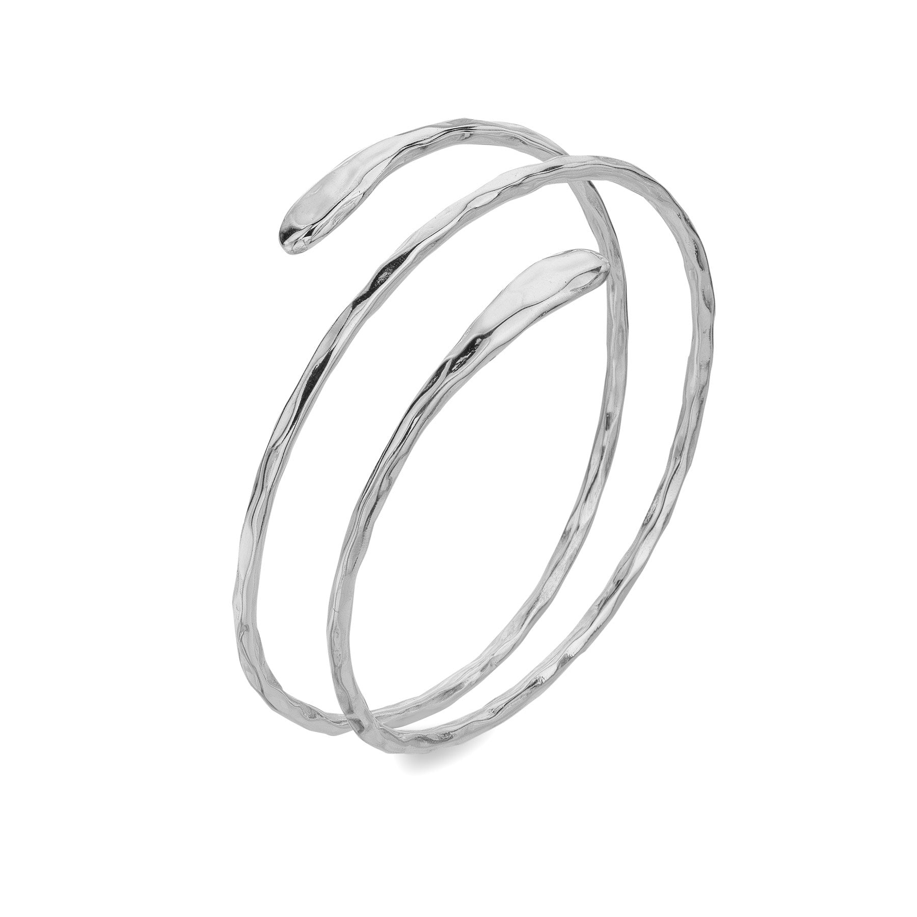 A handcrafted sterling silver spiral bangle with a hammered texture, featuring a double-wrap design, on a white background.
