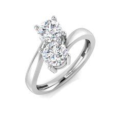 An angled view of a 9ct white gold two-stone ring, showcasing two sparkling round lab grown diamonds totaling 1.40ct.