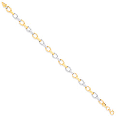 A 9ct gold bracelet with alternating yellow gold and white gold fancy links, shown diagonally on a white background.