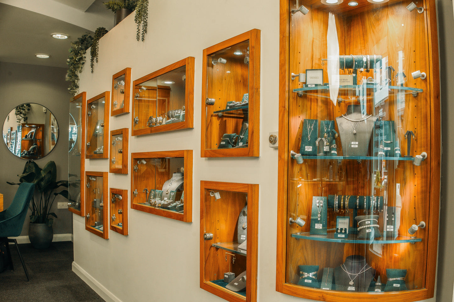 Griffin & Co Fine Jewellery store display case with various necklaces and pendants.