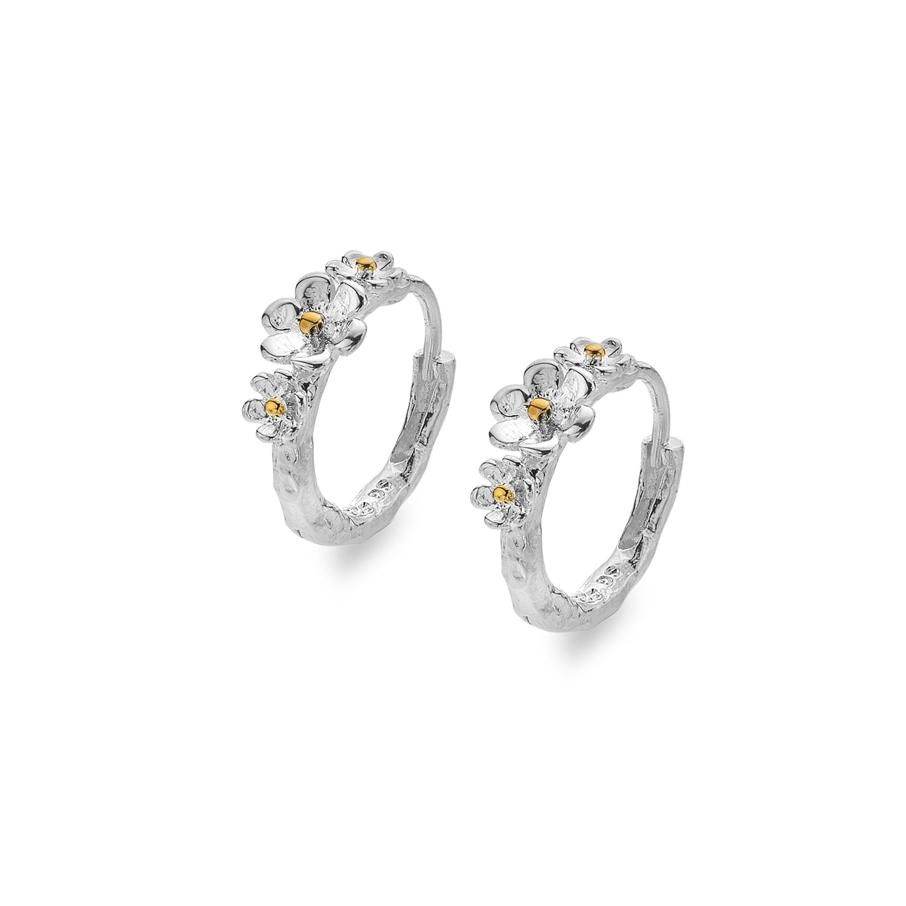 A pair of two-tone sterling silver and gold plate daisy hoop earrings, shown at an angle on a white background.
