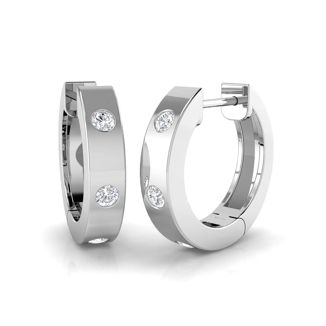Pair of 9ct white gold diamond earrings with six round brilliant diamonds