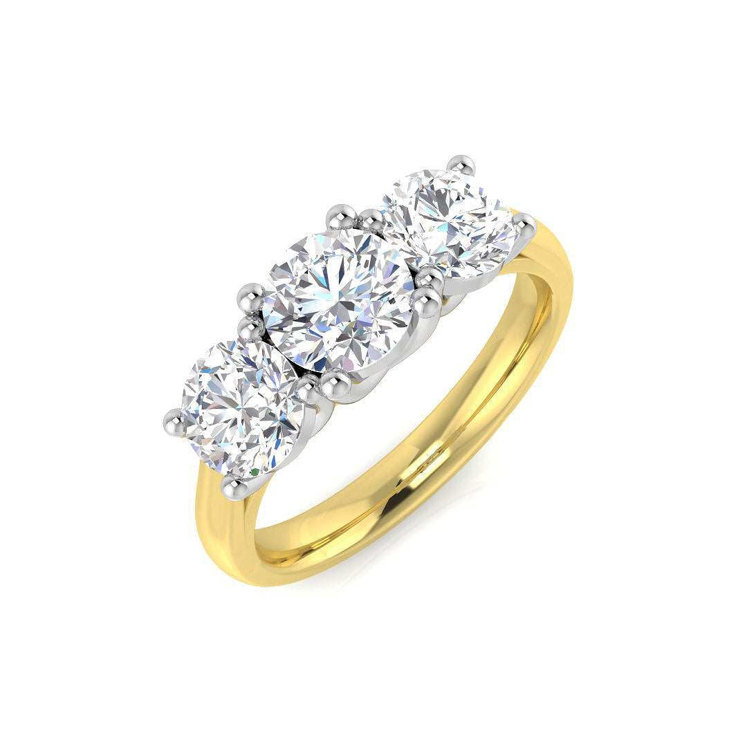An angled view of an 18ct yellow gold trilogy ring, showcasing three round lab grown diamonds set in white gold claws on a substantial gold band.