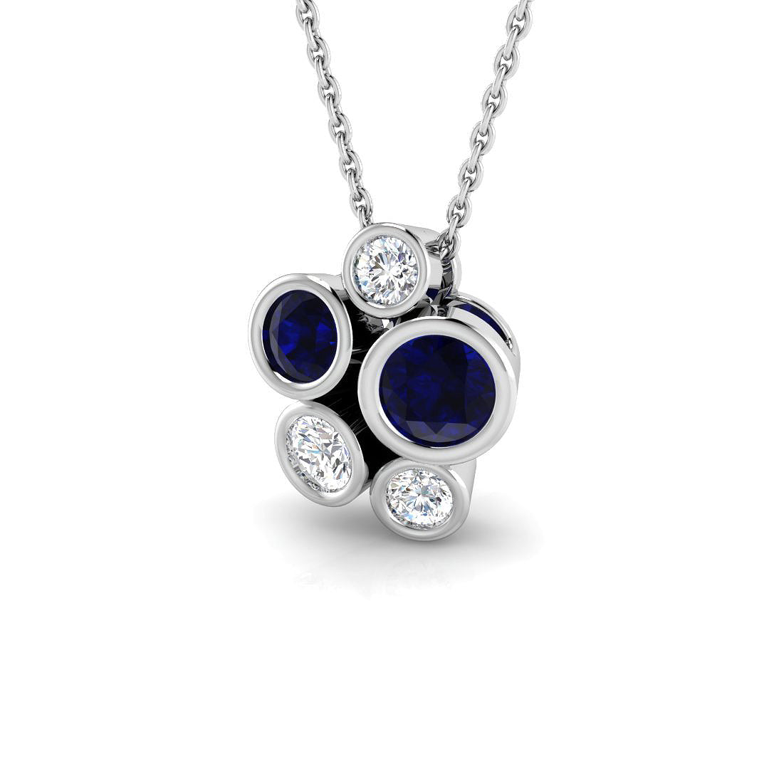 18ct white gold pendant featuring blue sapphire and diamond gemstones