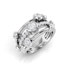 A wide, multi-band diamond wave ring in platinum or white gold, featuring a central river of pavé diamonds and scattered bezel-set diamonds, on a white background.