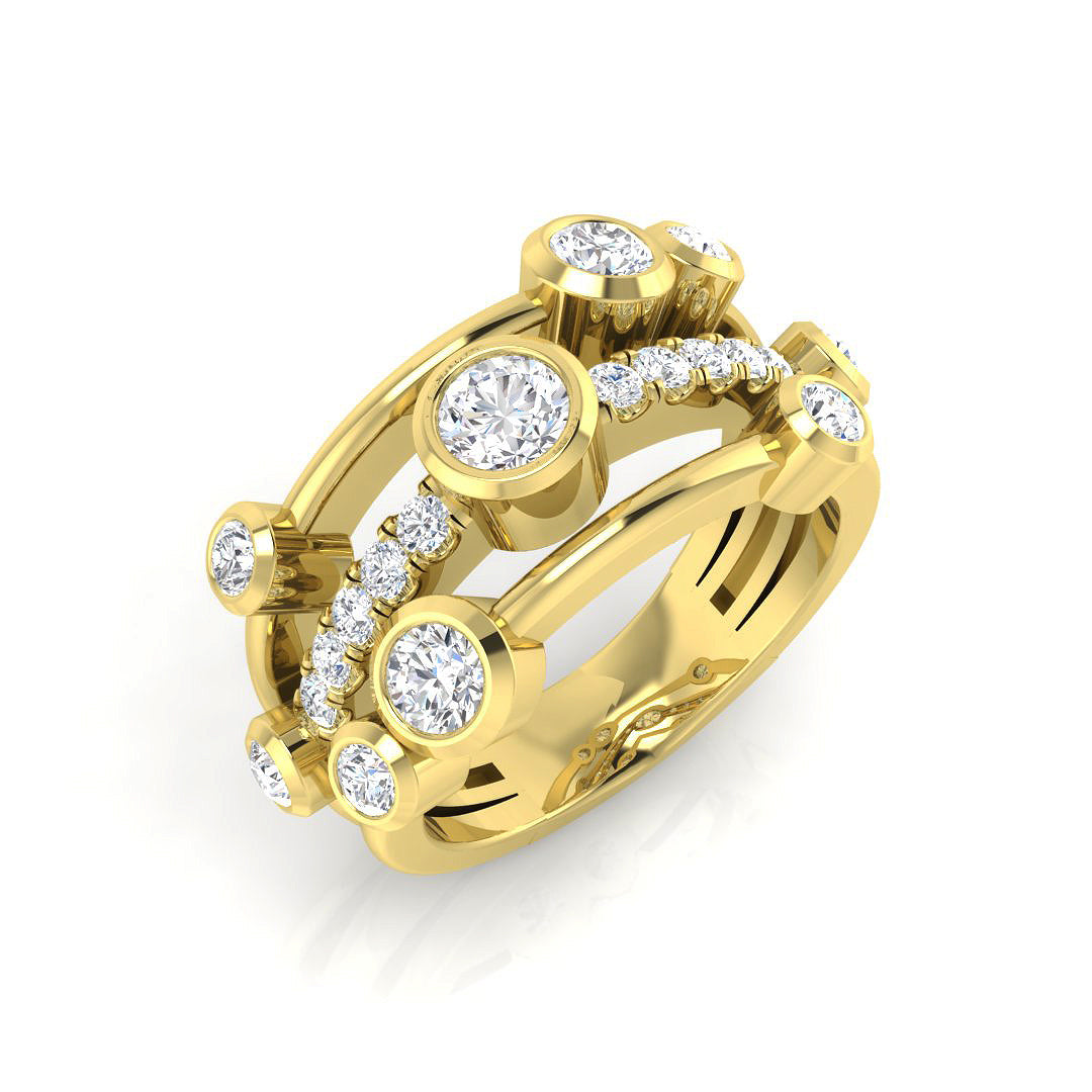 A wide, multi-band diamond wave ring in 9ct yellow gold, featuring a central river of pavé diamonds and scattered bezel-set diamonds, on a white background.