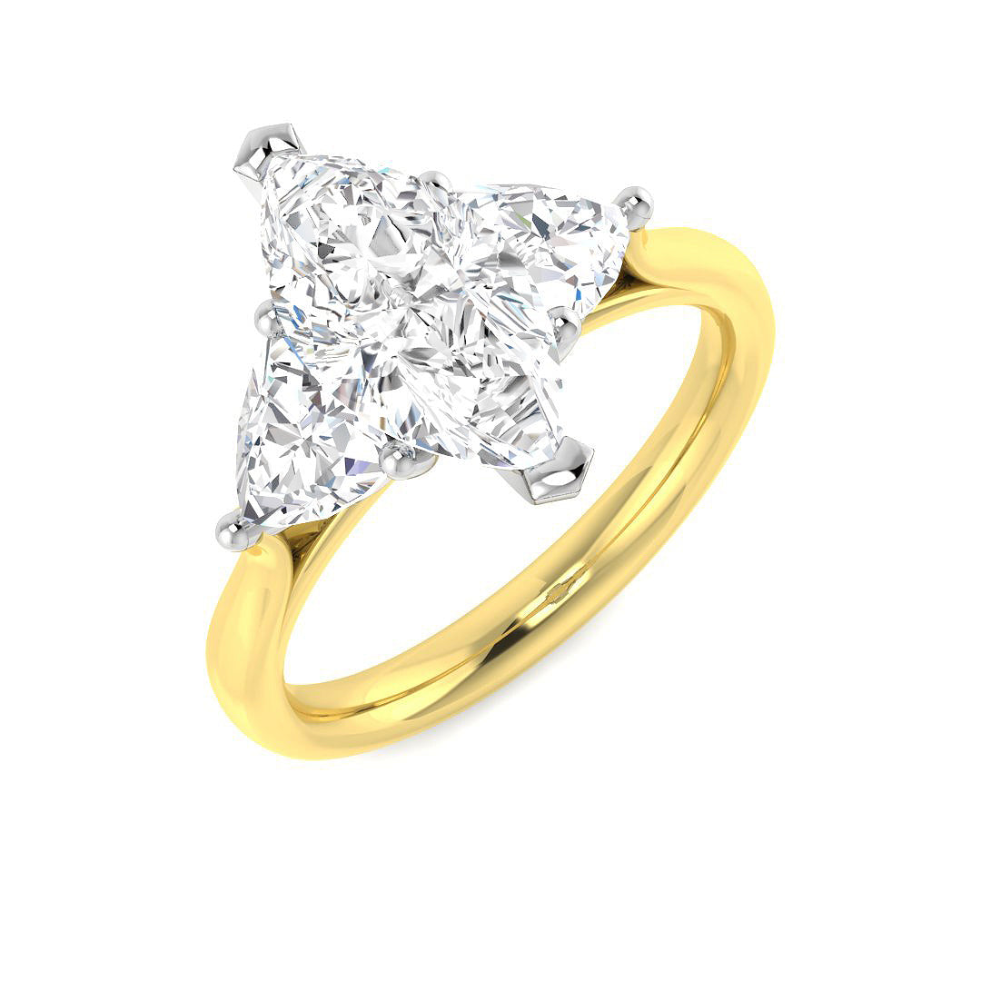 Overhead view of a 9ct two tone gold trilogy ring featuring a 1.52ct marquise lab grown diamond centre stone flanked by two trillion cut diamonds.