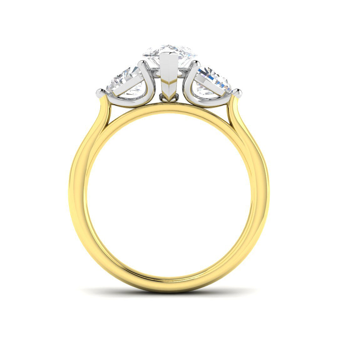 A side profile view of a 2.40ct diamond ring, showing the white gold claw settings holding a marquise and trillion stones on a yellow gold band.