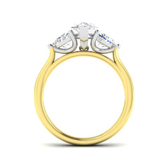 A side profile view of a 2.40ct diamond ring, showing the white gold claw settings holding a marquise and trillion stones on a yellow gold band.