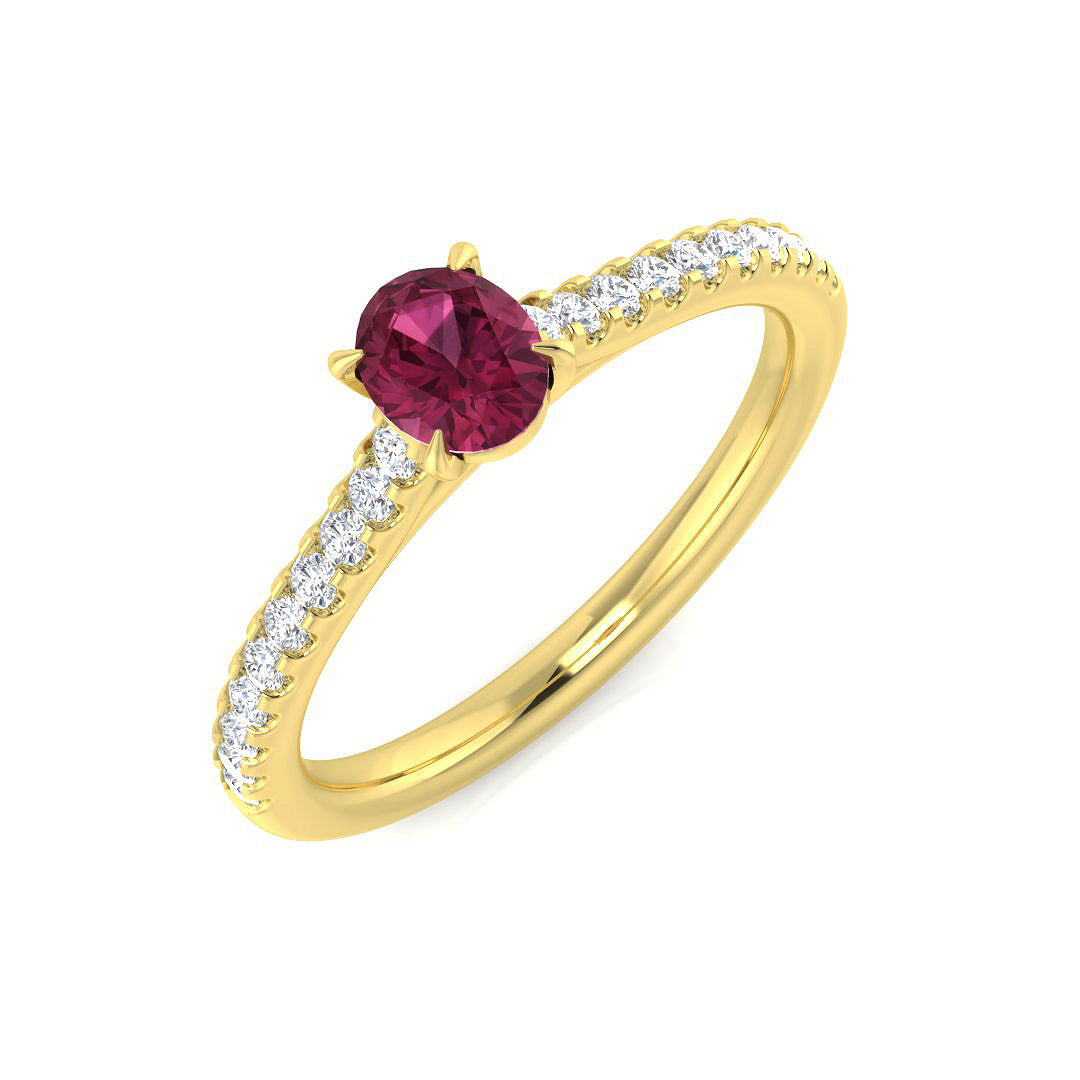 An oval pink tourmaline and diamond pavé engagement ring, crafted in 9ct yellow gold, on a white background.