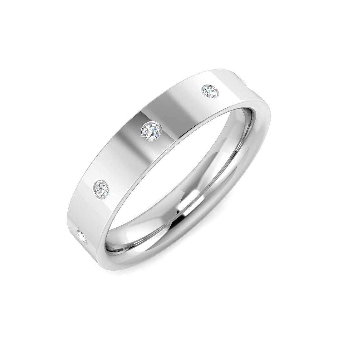 Angled view of a heavyweight platinum wedding band featuring five round lab grown diamonds flush set into the ring.