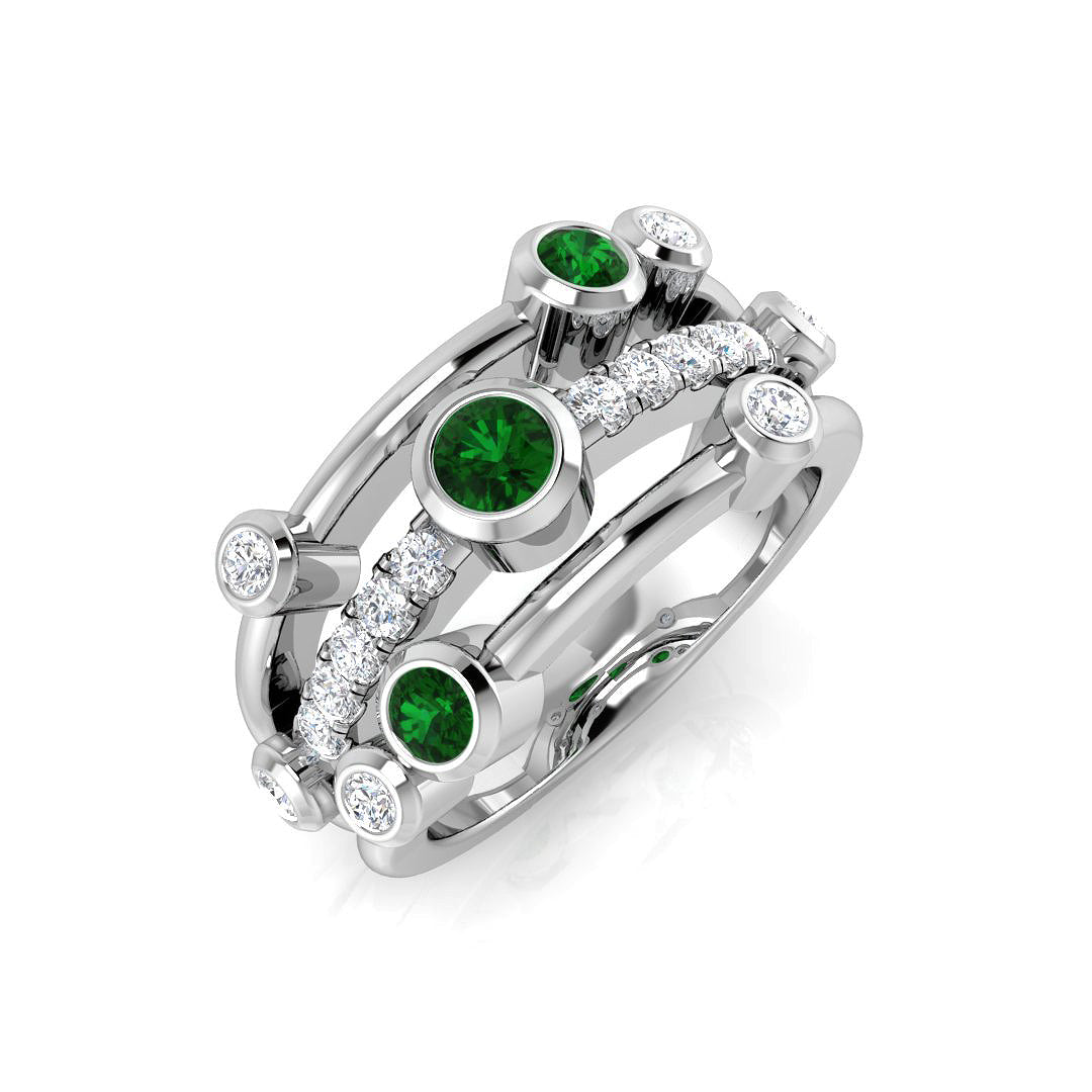 9ct White Gold multi-row ring featuring scattered bezel-set emeralds and diamonds with a central pavé band.