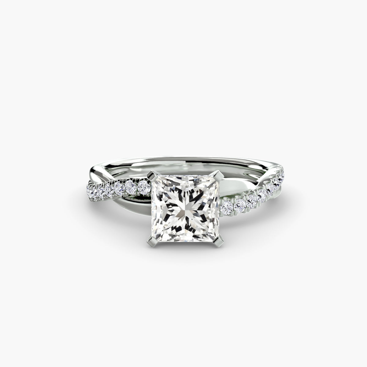 The Emerald Twist pavé ring setting, in white gold, side view, shown with a princess-cut lab-grown diamond