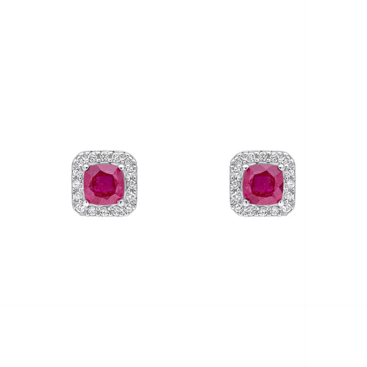 A pair of 9ct white gold stud earrings featuring a cushion-cut ruby surrounded by a diamond halo, shown on a white background. 1920