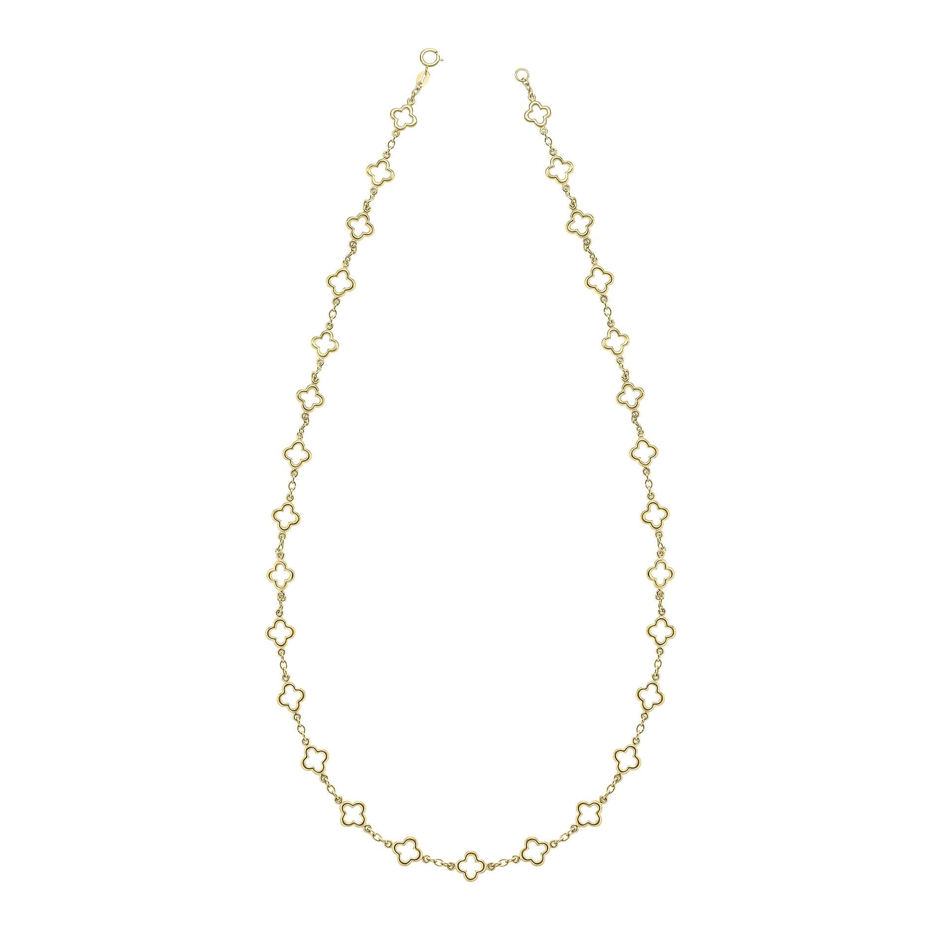 A close-up view of the gold quatrefoil station necklace, highlighting the detailed texture of the flower-like links.