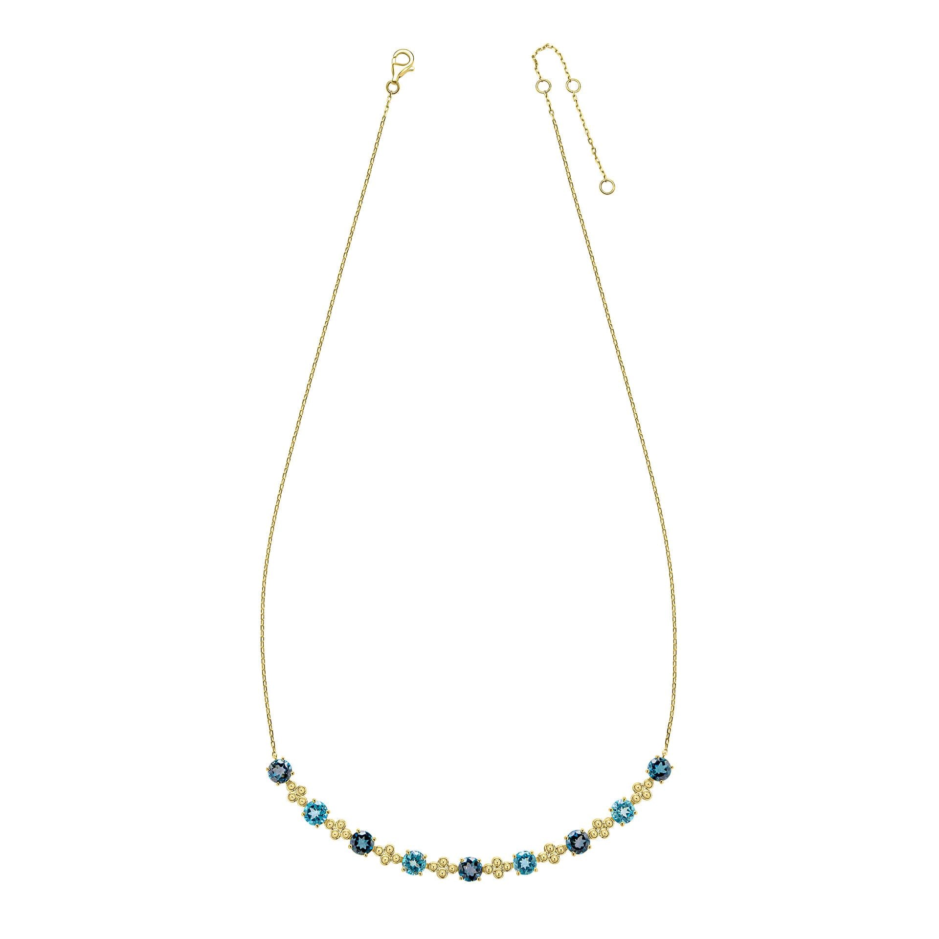 A 9ct yellow gold necklace featuring alternating stations of round London Blue and Swiss Blue Topaz gemstones with intricate gold detailing, on a white background.