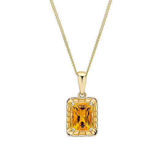A 9ct yellow gold pendant featuring an octagon-cut citrine gemstone surrounded by a detailed, textured gold frame, shown on a fine gold chain. 1920
