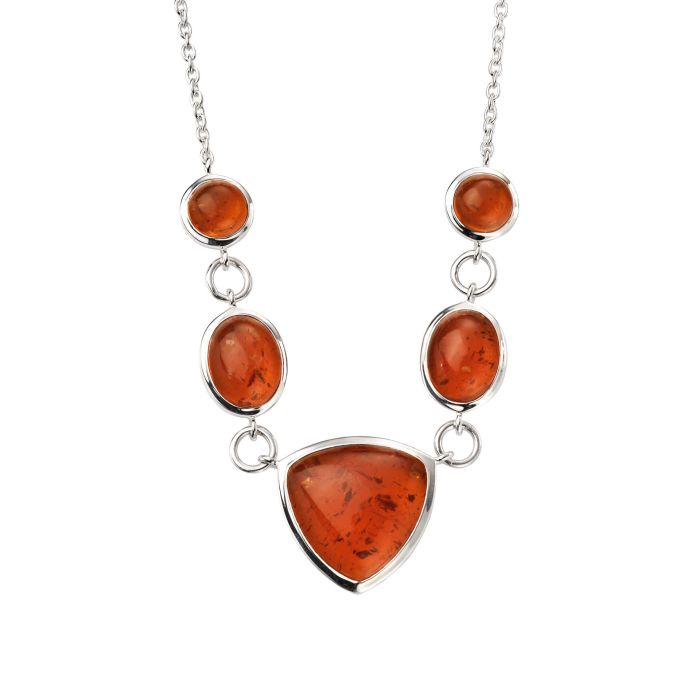 Necklace with amber stones on a white background