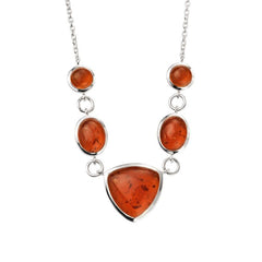 Necklace with amber stones on a white background
