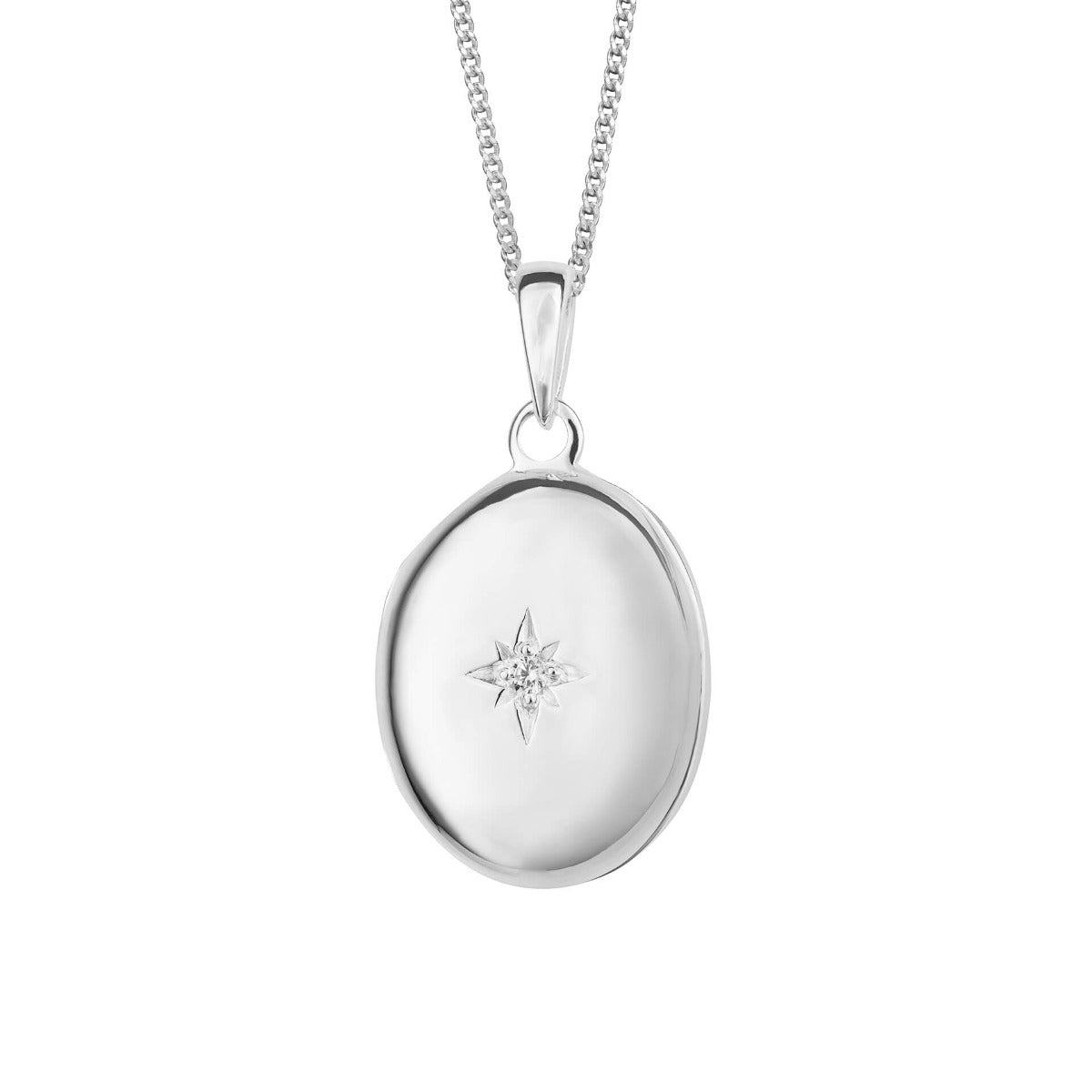 Oval locket pendant with starburst cubic zirconia in recycled sterling silver
