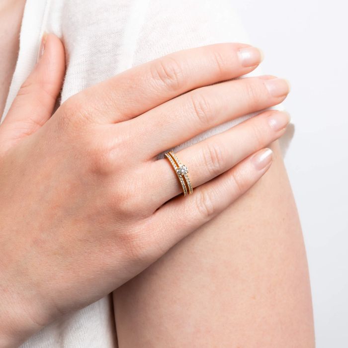 Model wearing bridal ring set in sterling silver