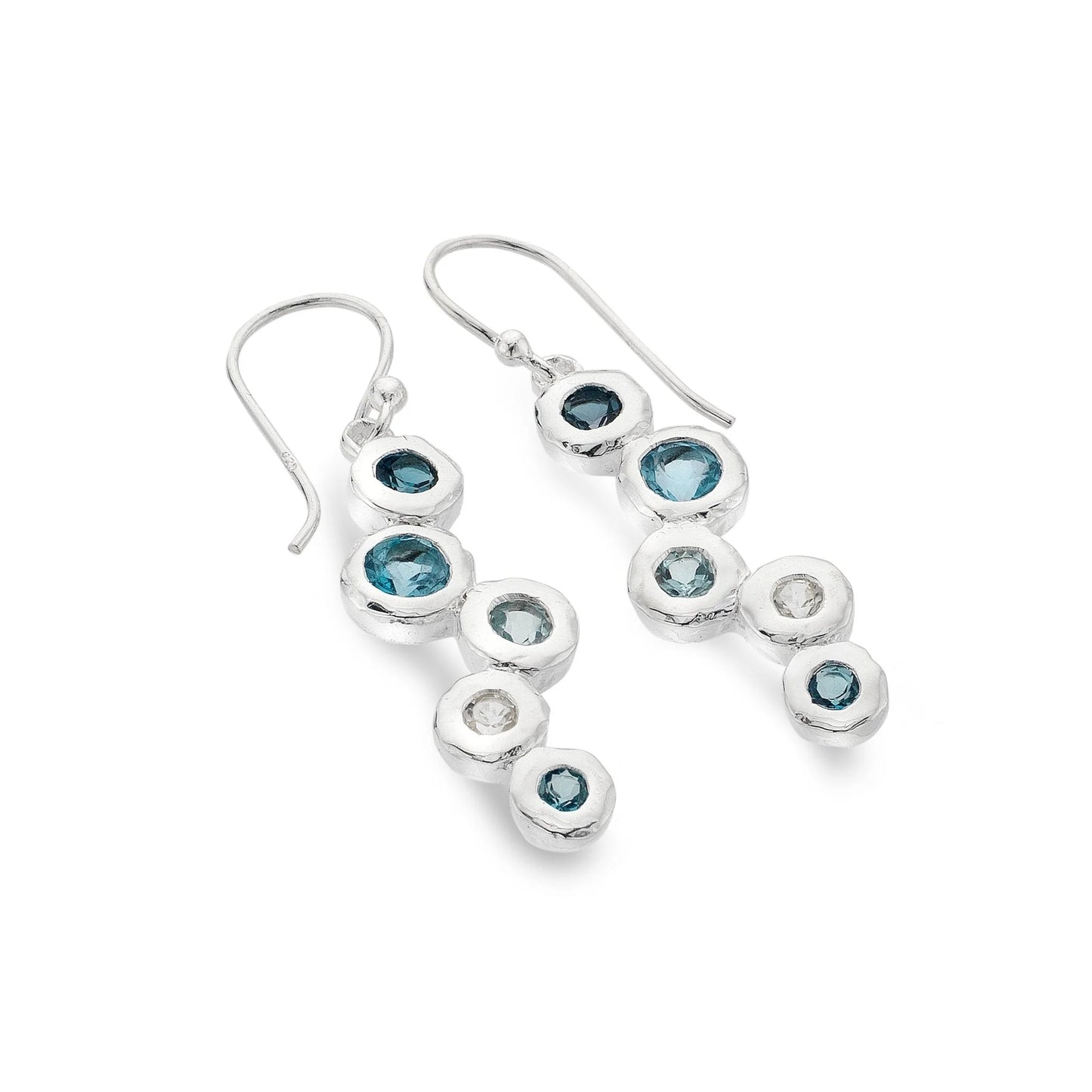A close-up, high-angle shot of a pair of sterling silver drop earrings featuring multiple round blue and white topaz stones set in an organic, cascading design. The earrings are displayed on a white background.