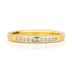 A front view of a 9ct yellow gold diamond eternity ring featuring a channel setting with 25% diamond coverage.