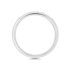 A top-down profile view of a white gold diamond ring, displaying the sleek, polished silhouette.