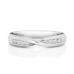 A front view of a white gold diamond crossover ring, highlighting the brilliant sparkle of the 0.16ct diamonds.