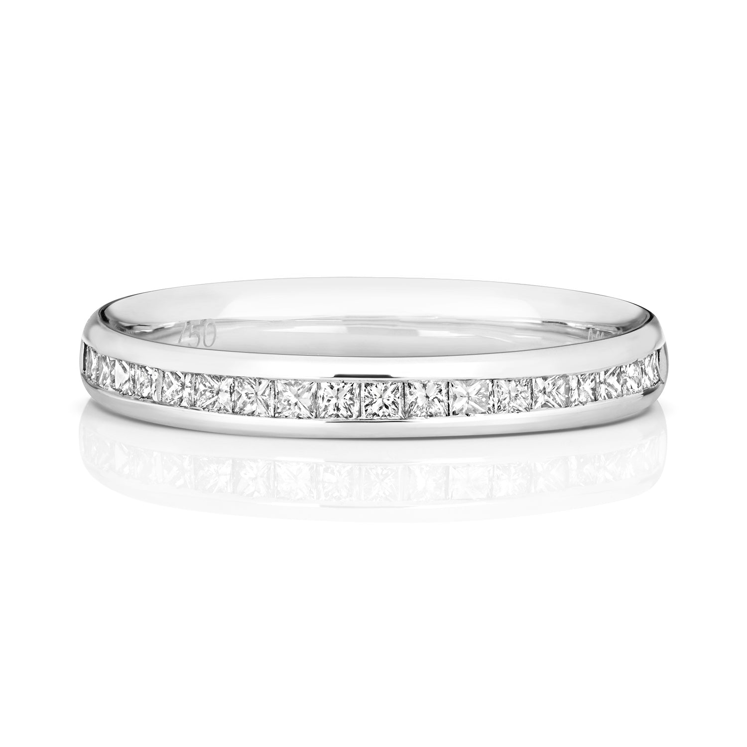 A front view of a platinum half eternity ring featuring princess cut diamonds in a channel setting.